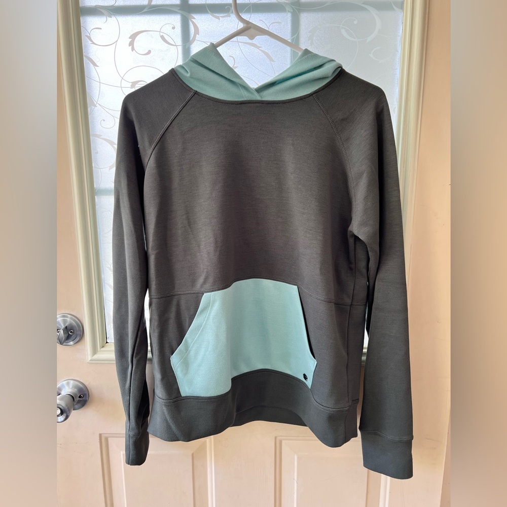 Gaiam size S hooded long sleeve pullover with kangaroo pocket. Color blocking